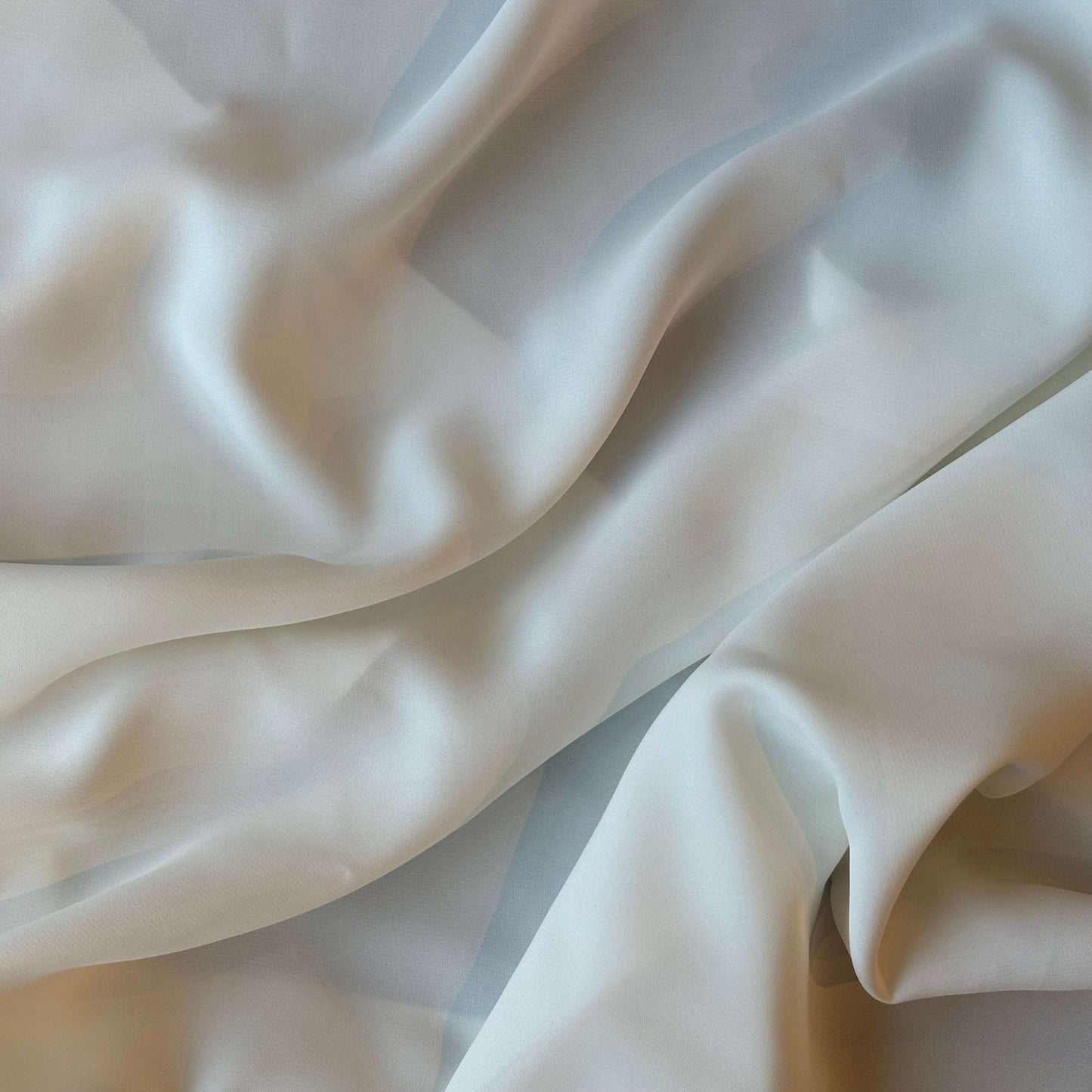 Presenting Bliss a dressweight ivory Poly weft stretch yarn fabric
