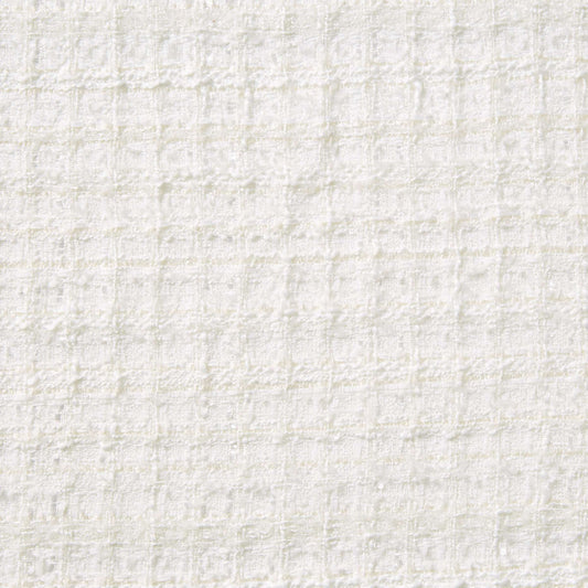 Showing chanel look an ivory colored sophisticated textured tweed bouclé pure polyester with lurex thread