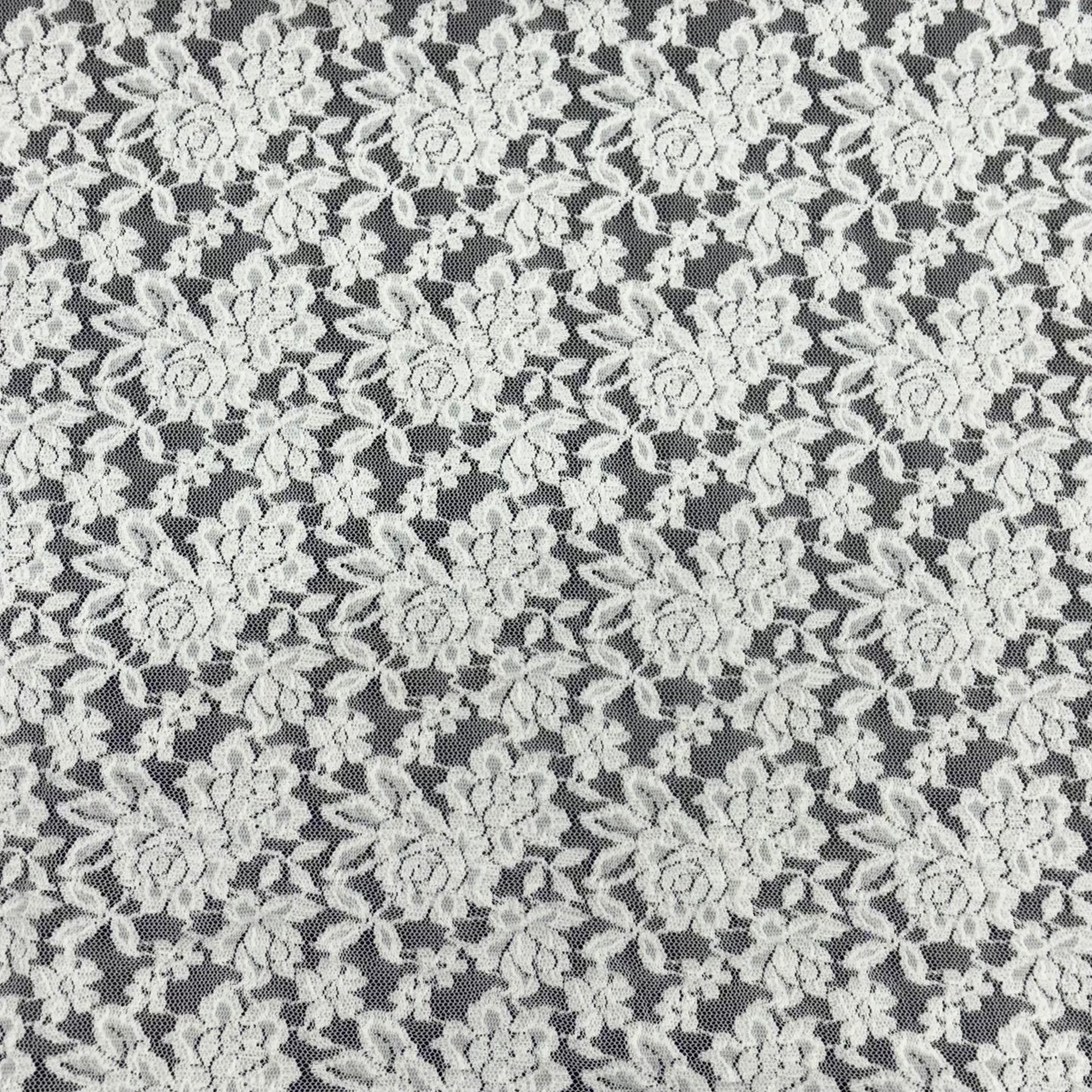 Displaying Dash Stretch Lace ivory cclored spandex and polyester blended floral body weight stretchable lace fabric