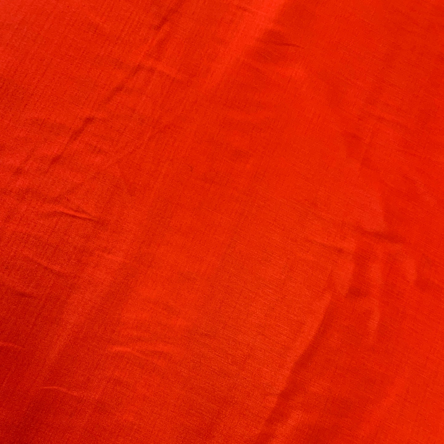 Presenting the Linus fire colored rayon and polyester blend with a sateen sheen