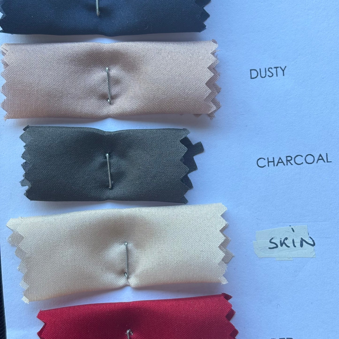Presenting a selection of color card swatches dusty, charcoal and skin for Jap Silk