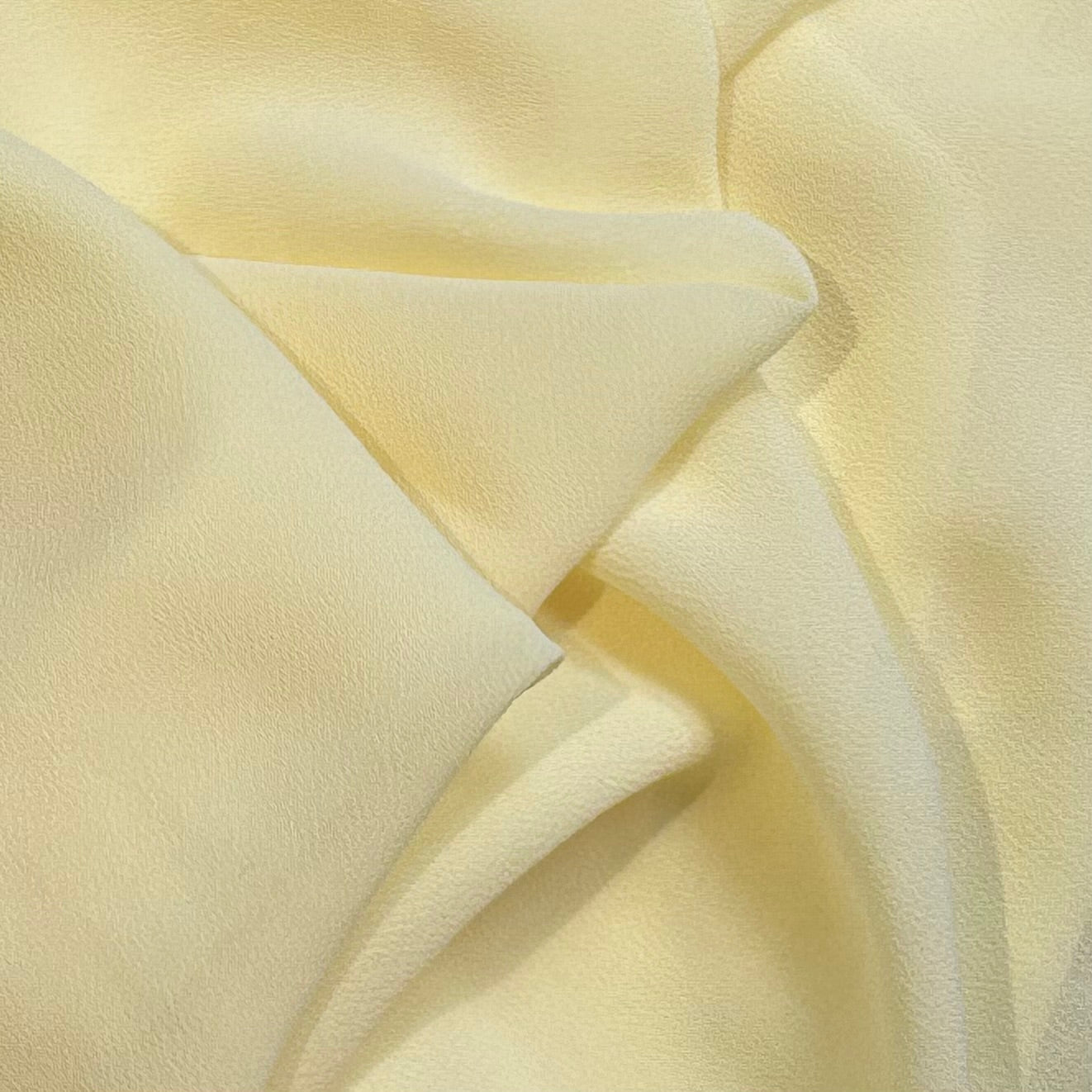 microgette presenting the lemon color version of a sheer soft plain weave Polyester microfibre with matte face and good drape
