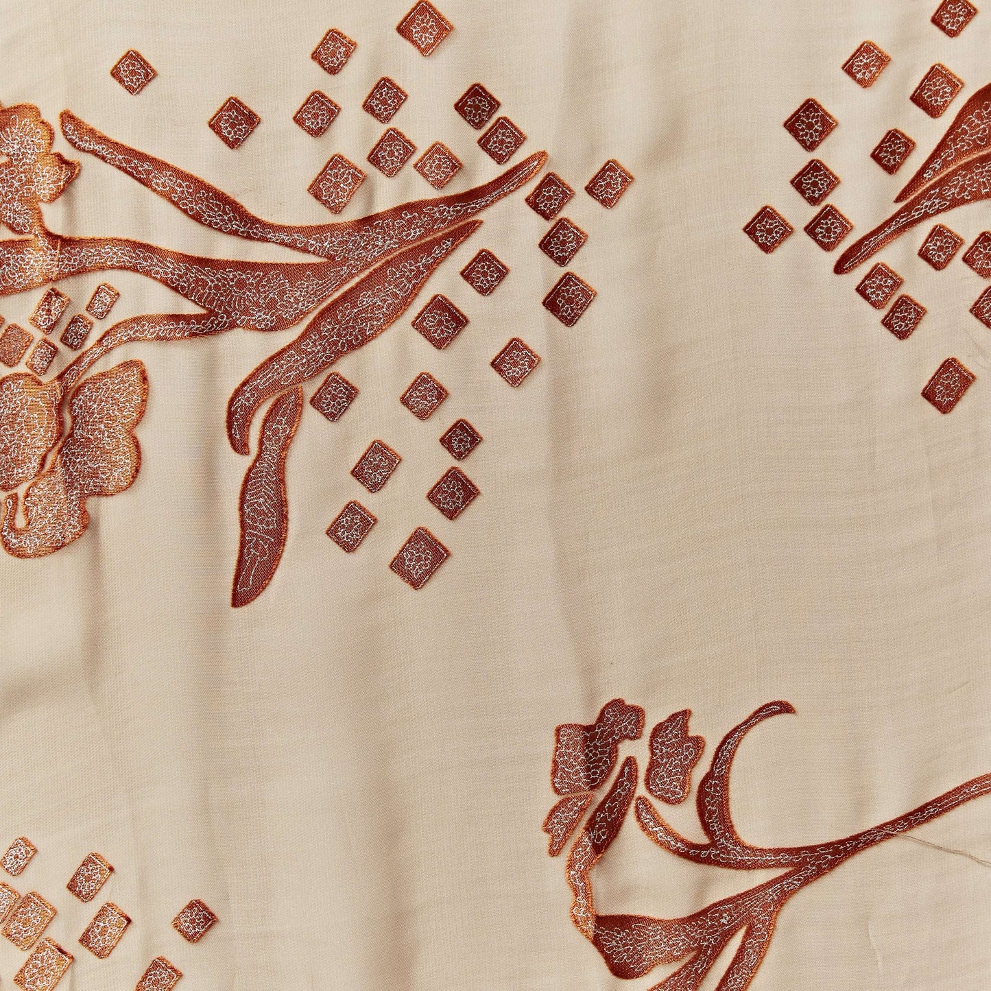 Exhibiting nirvana a cashew colored soft silk and rayon blended chiffon floral burnout devoré featuring good drape
