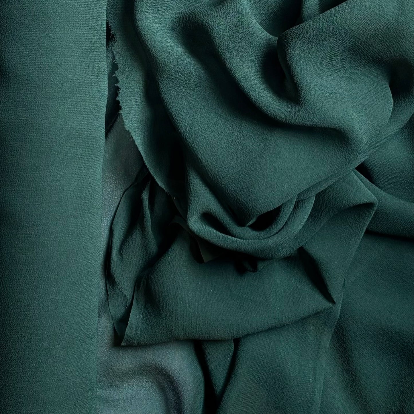 silk georgette presenting the bottle color version of a Lightweight sheer floaty pure silk with excellent drape great for layering and gathering