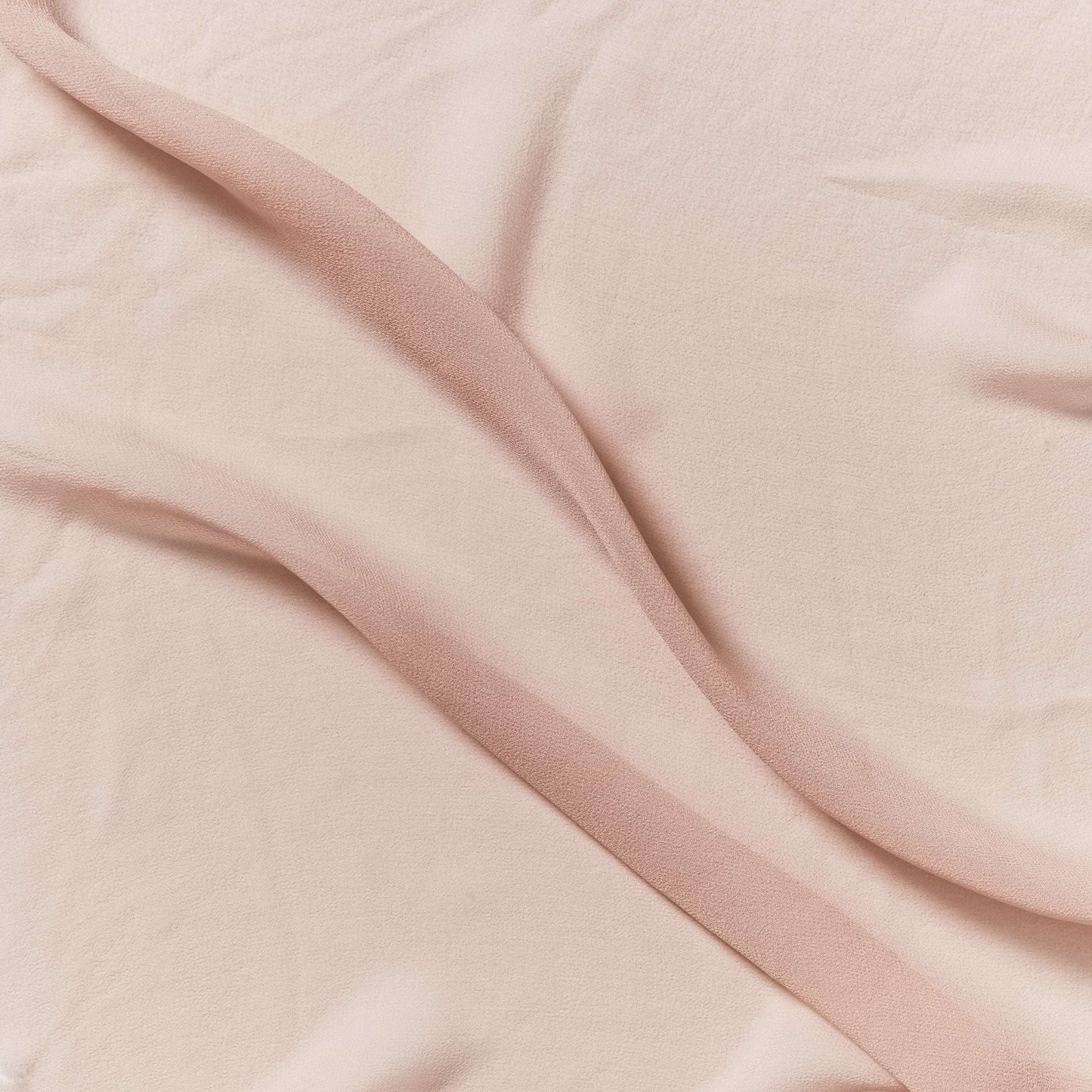 silk georgette showing the salmon color version of a Lightweight sheer floaty pure silk with excellent drape great for layering and gathering