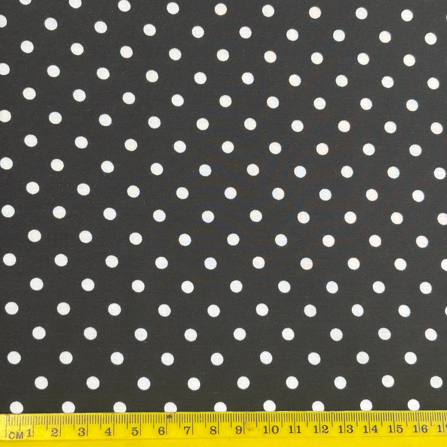 Presenting Spotty which features a spot print on a washable silk and rayon blend fabric with ruler