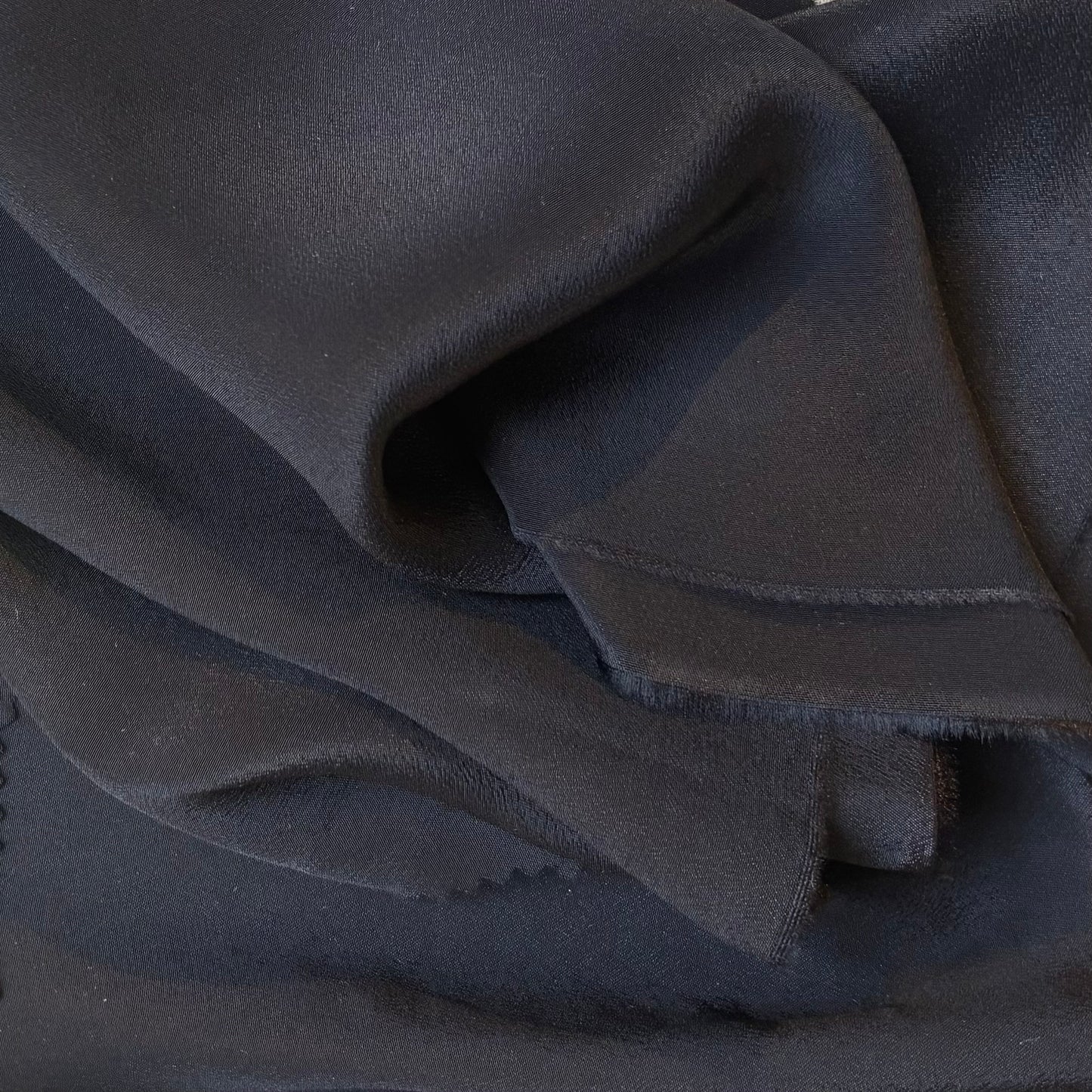 Presenting Sylvie and silk and viscose like blended Crepe De Chine in a black shade