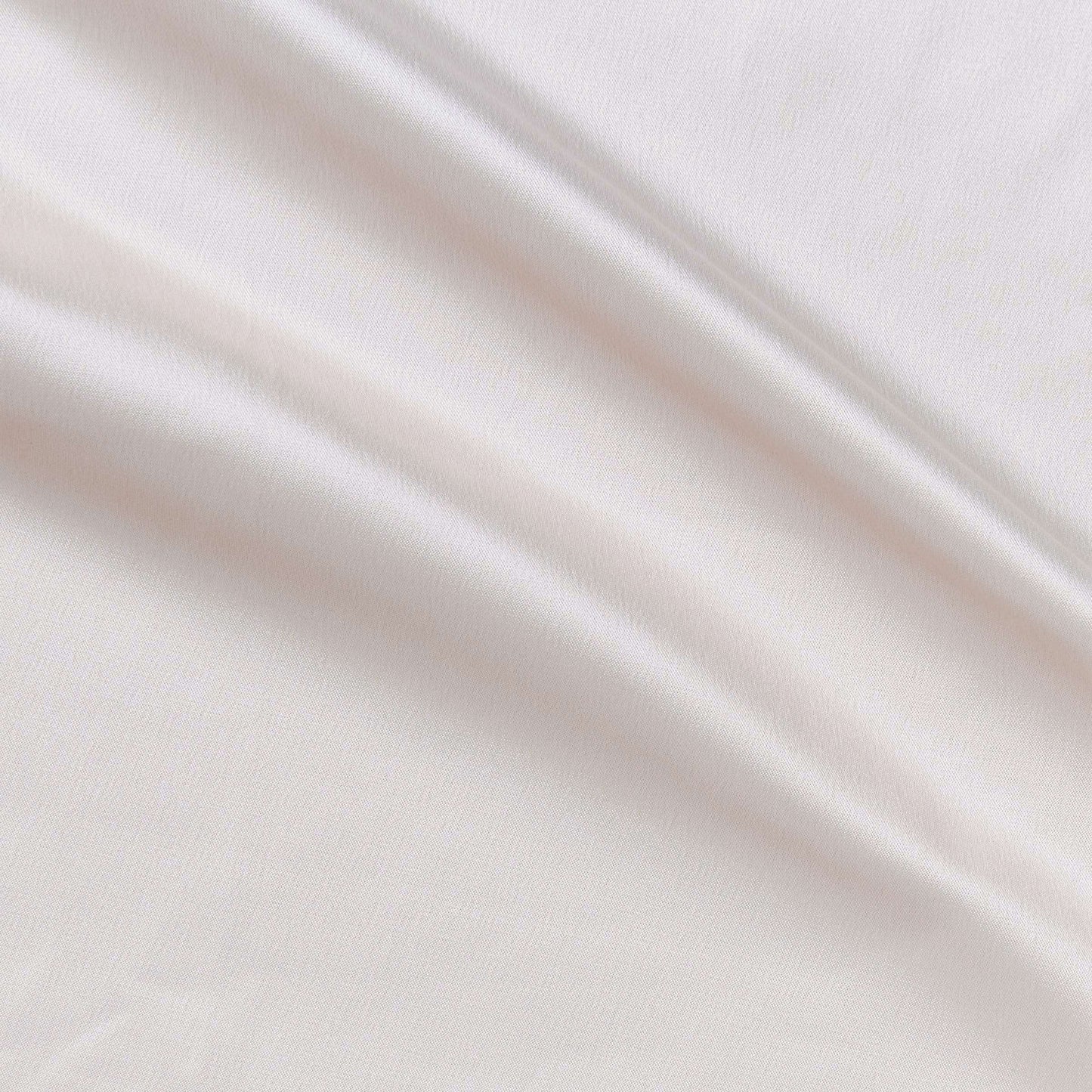 Trump showing the Ivory color version of a stretch duchess satin polyester and lycra blend with a delustered smooth sateen finish and gutsy weight