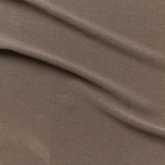Ace presenting the taupe color version of a stretch smooth polyester and spandex blend with great drape