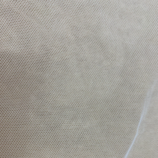 Displaying Angel Tulle an ivory colored sheer soft pure nylon tulle in close up