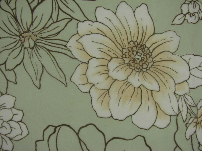 ava showing the avacado version neutral base color with line style Floral Print on sheer light weight pure Polyester in closeup