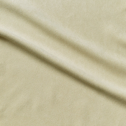 bambi showing the chamois color version which is a vegan suede like durable pure polyester with moderate drape