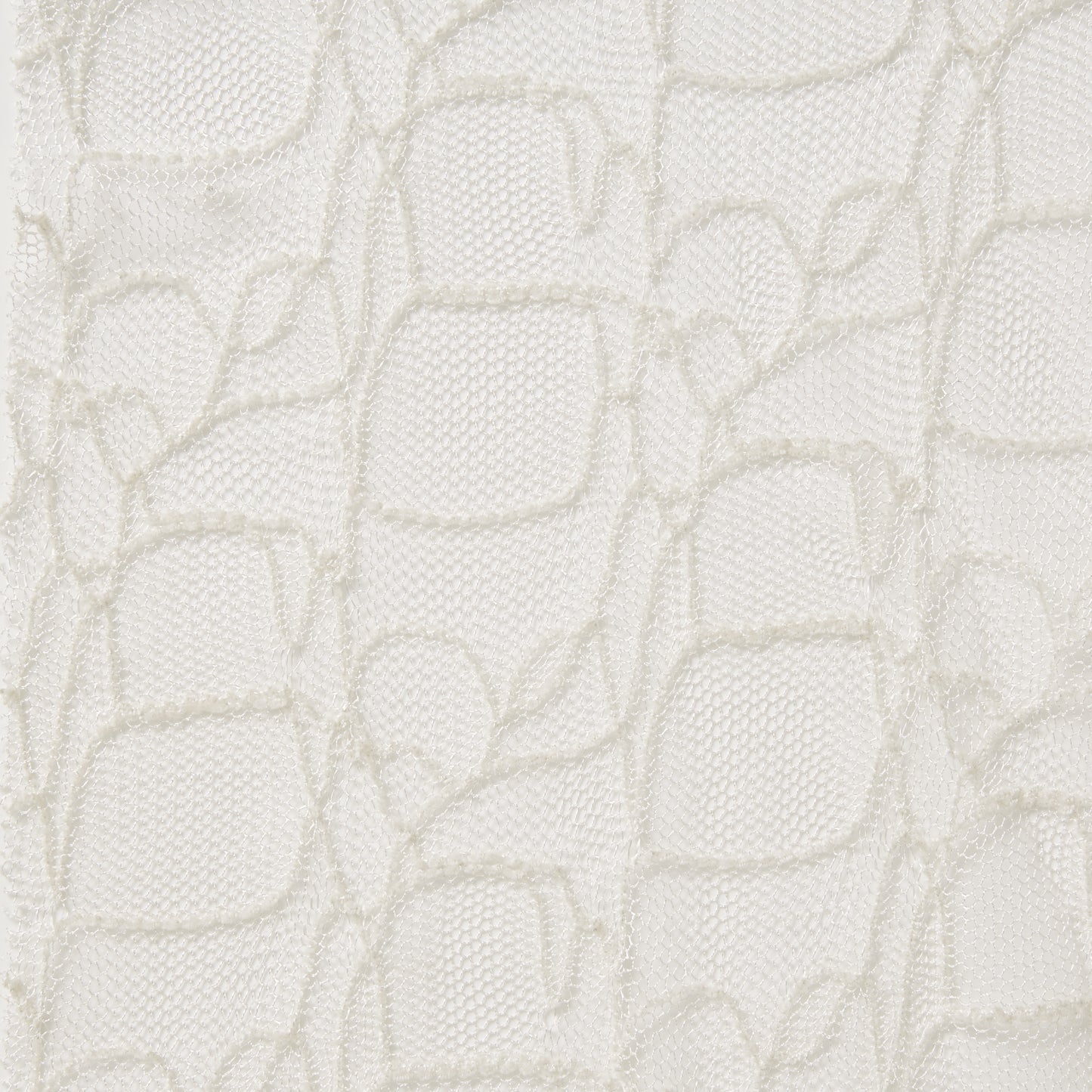 Displaying bedlam ae ivory color fabric with an elegantly simple embroidered design on ivory mesh base as a polyester and rayon blend