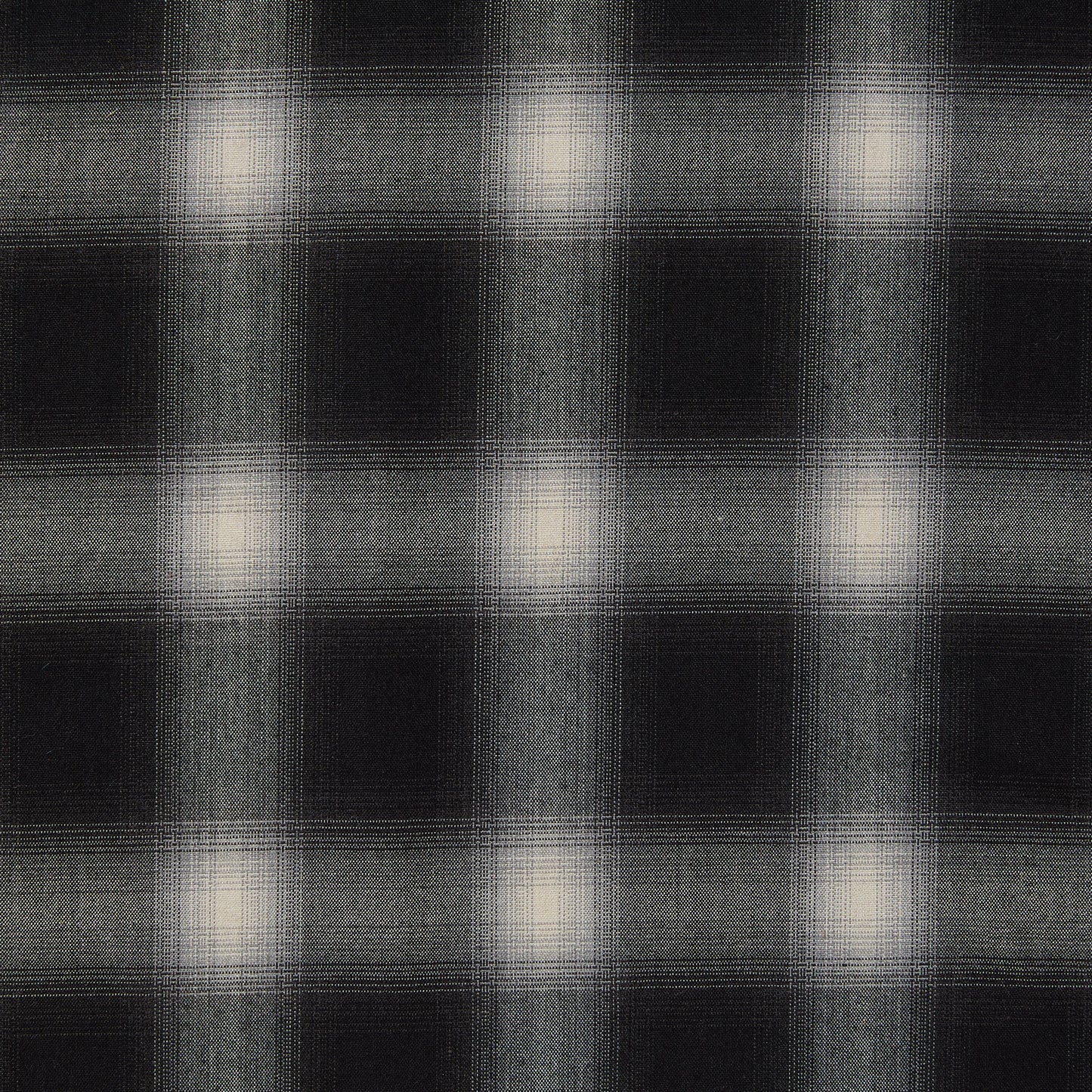 Showing Blur which features black shaded colors on soft checks on a stretch polyester and rayon with spandex for stretch
