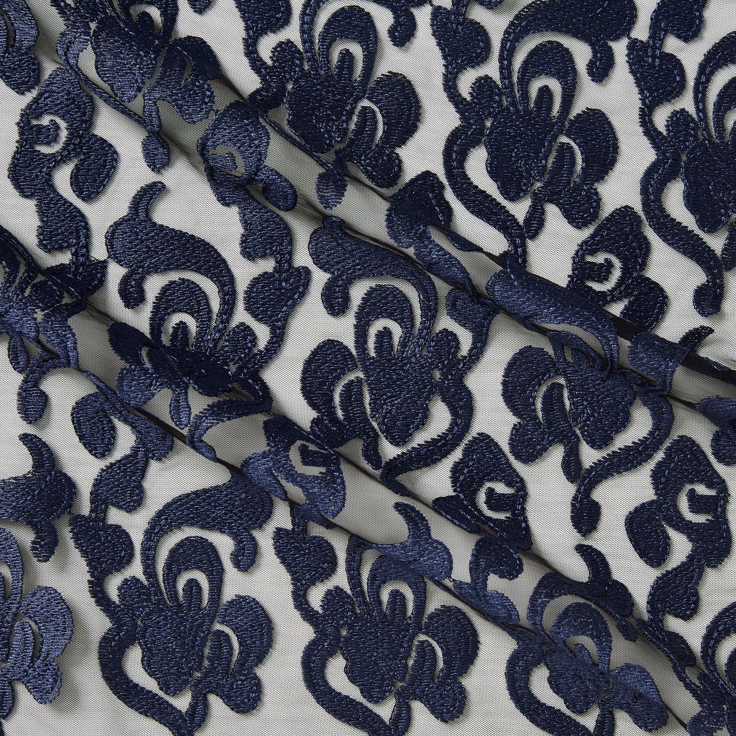 brooklyn presenting the navy color version floral embroidery on rayon and polyester mesh base