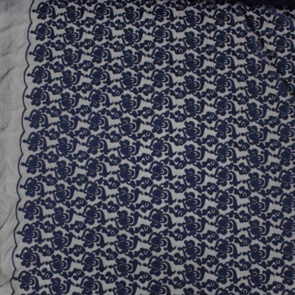 brooklyn presenting the navy color version floral embroidery on rayon and polyester mesh base with scalloped edge