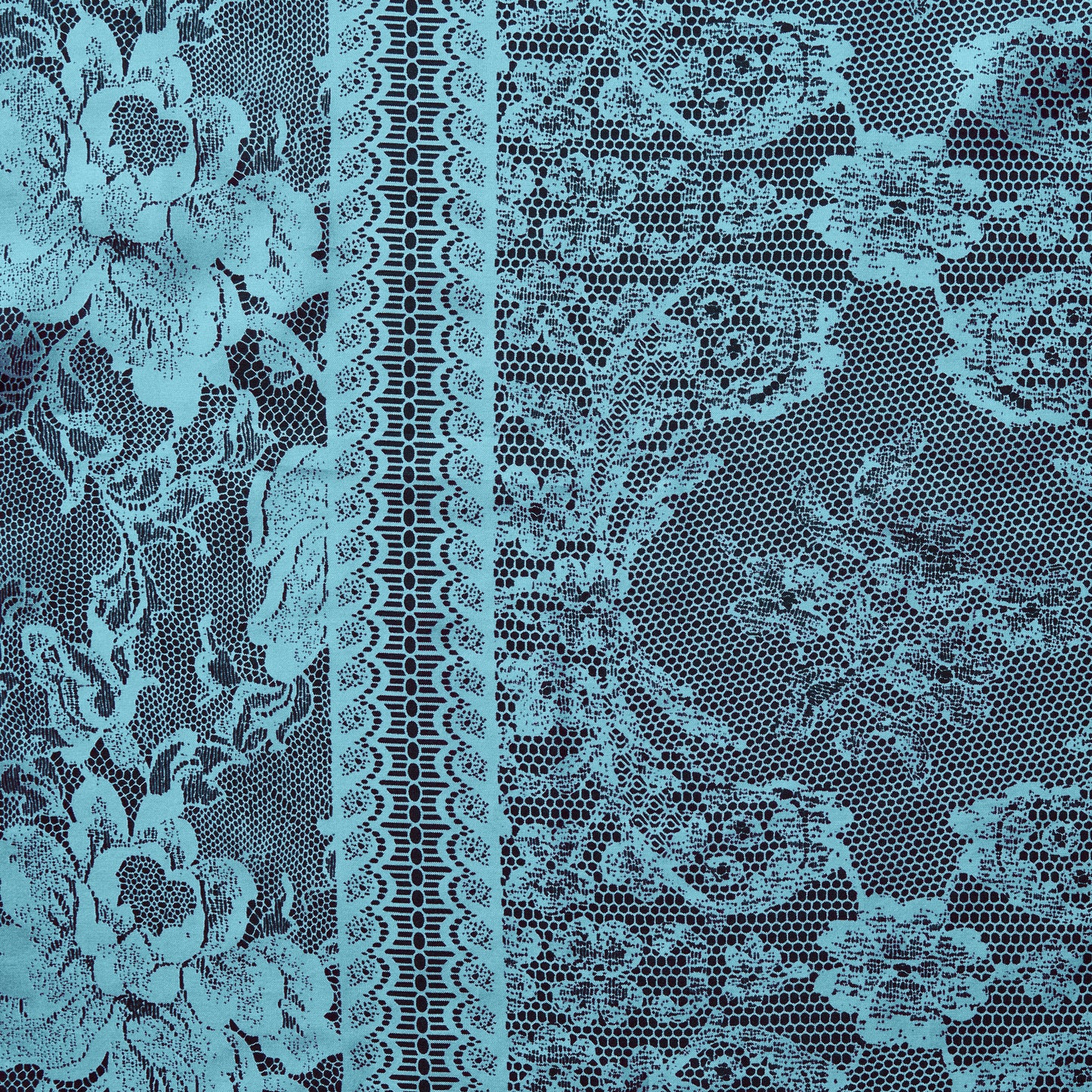 candice displaying the aqua colored version featuring floral Rochelle lace print on lightweight pure jap silk with fluid drape