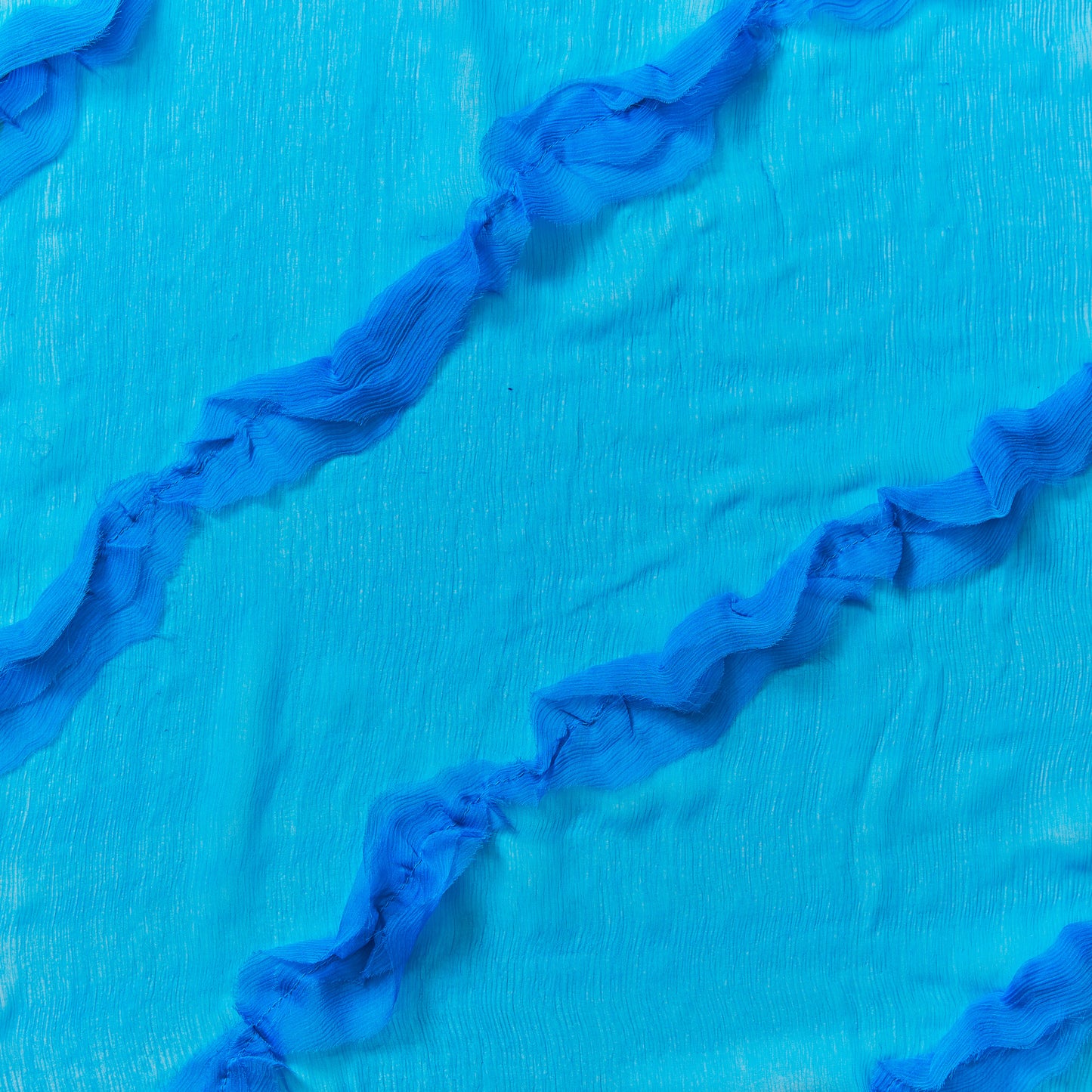 cascade presenting the Lipstick color version crinkle light weight sheer pure silk chiffon with diagonal ruffle flounce
