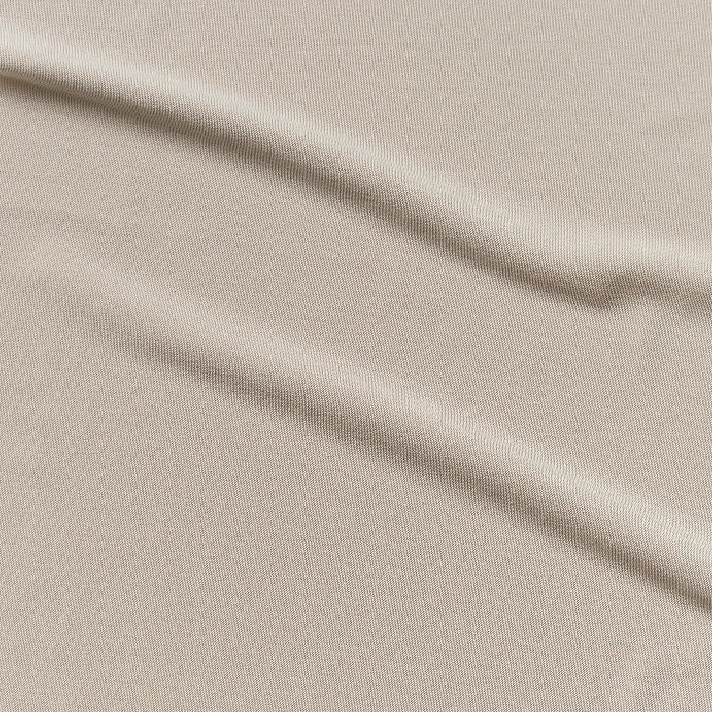 cavallii displaying the mocha color version with smooth stretch fine knit jersey polyester with added spandex