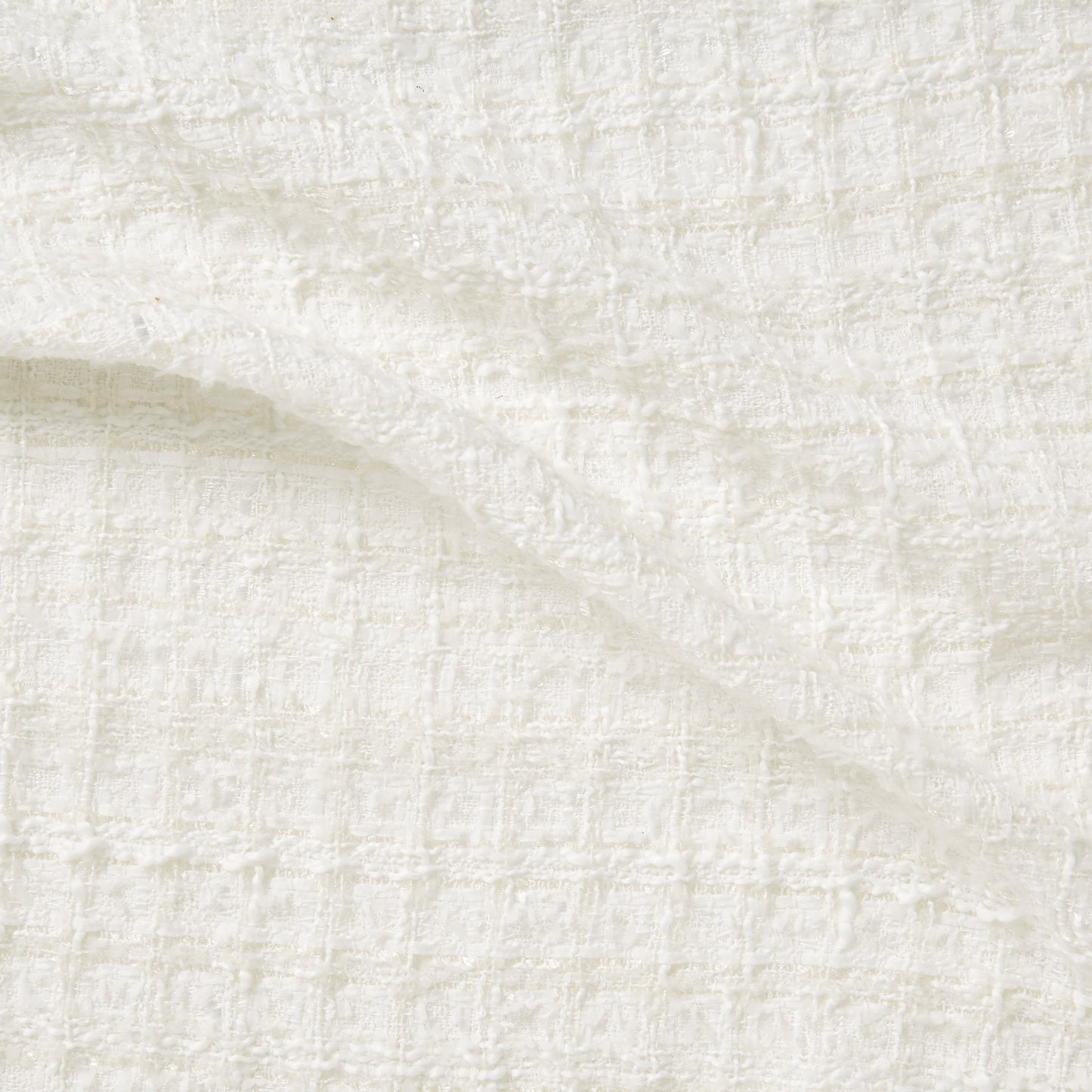 Presenting chanel look an ivory colored sophisticated textured tweed bouclé pure polyester with lurex thread