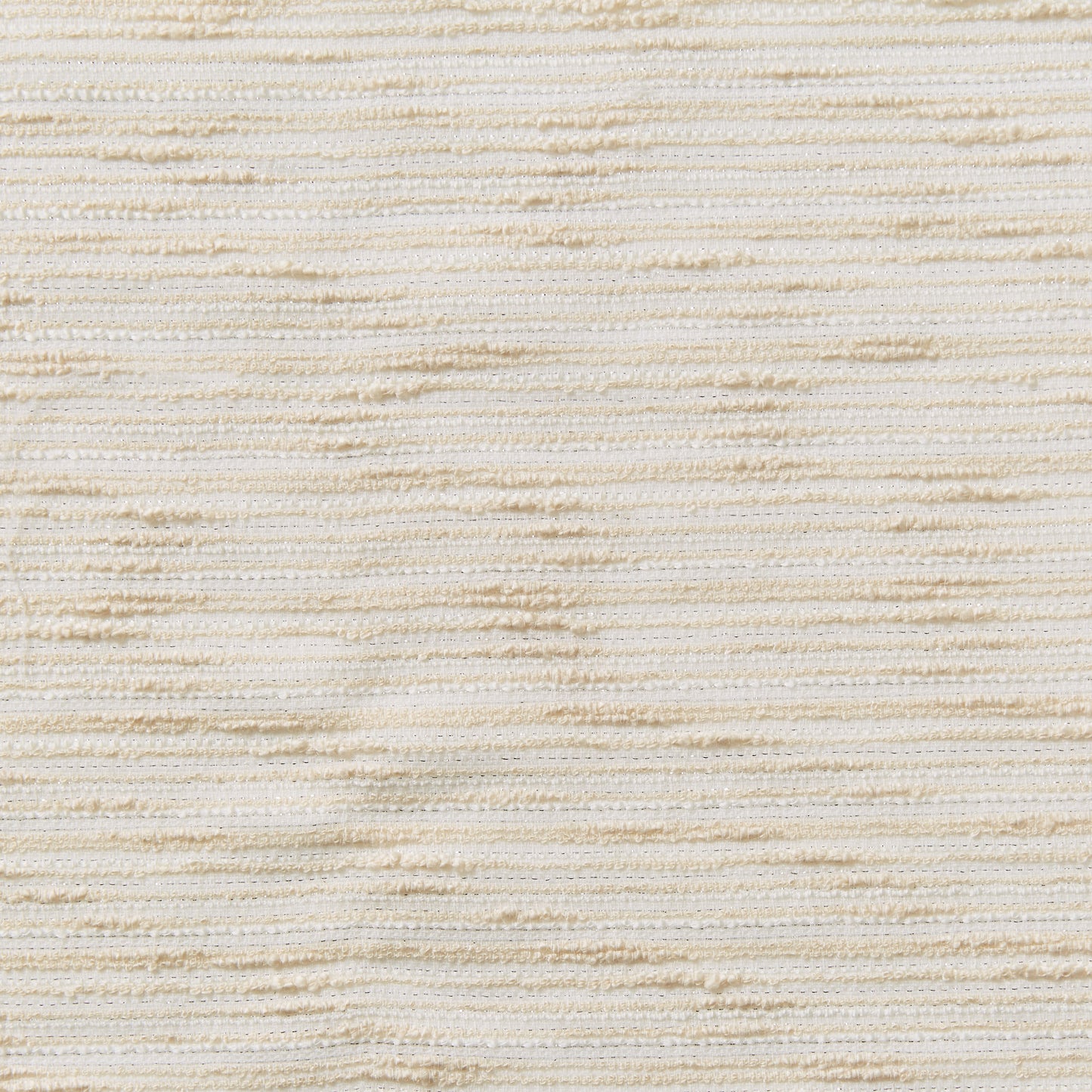 coco displaying the cream color version of a bouclé fabric cotton blend with lurex thread