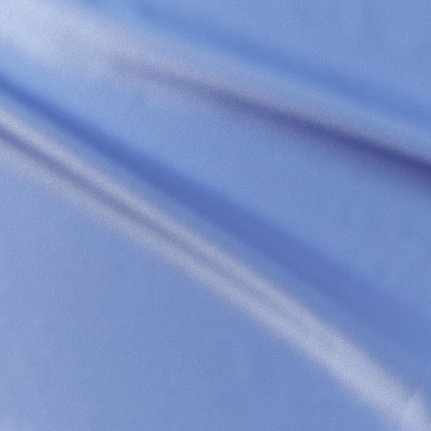 countess presenting the crystal color version of a crisp satin pure polyester fabric with moderate drape