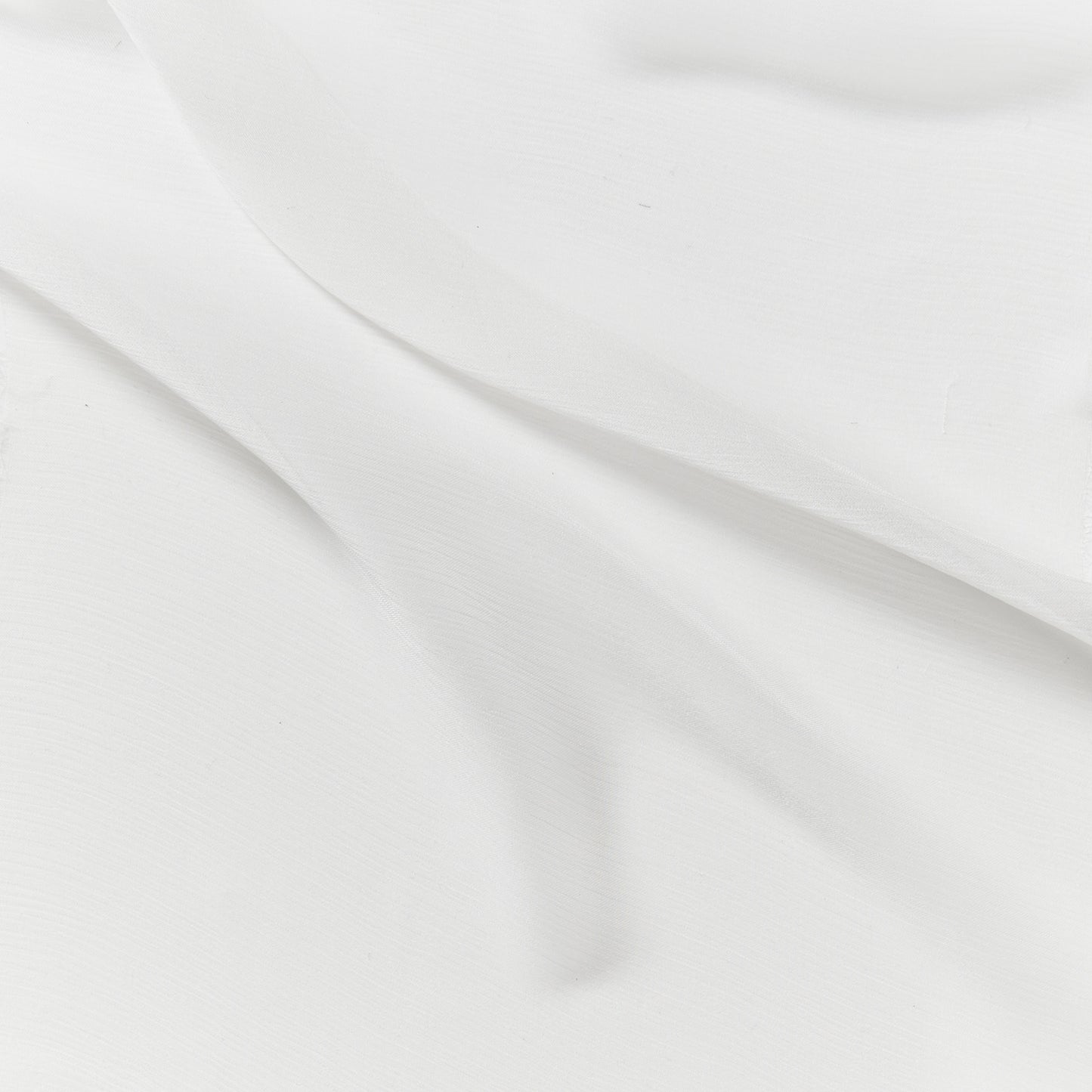 silk crinkle chiffon presenting the natural color version of a sheer soft pure silk with textured yoryu weave and fluid drape