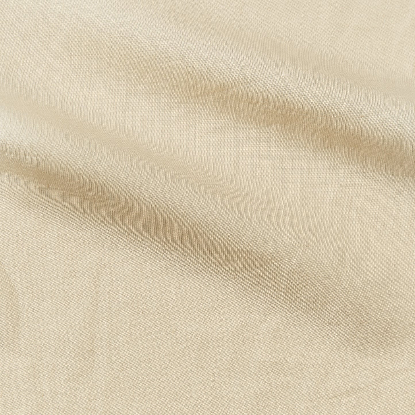 cruise presenting the biscuit color version of a lightweight linen and polyester blend with subtle sheen and moisture wicking properties