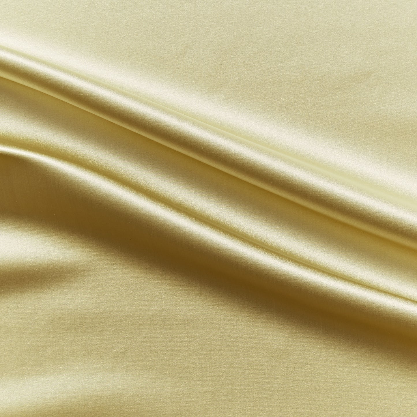 Duchess presenting the light gold color version on heavy weight mulberry silk satin with moderate drape