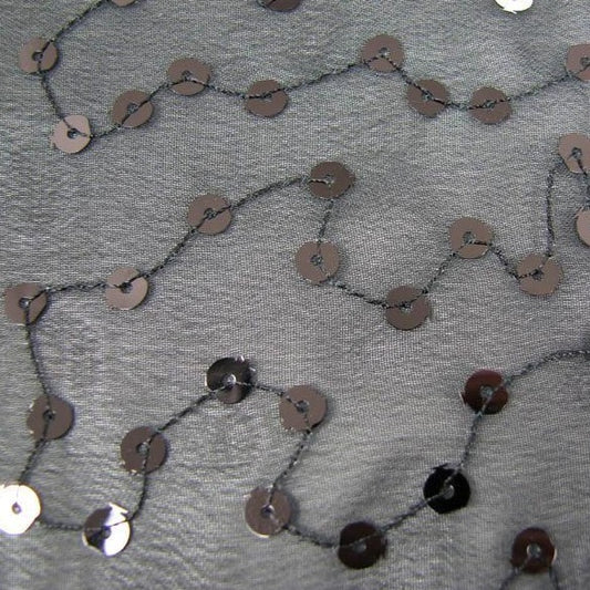 Presenting Domino with Sequins in zig zag patterns on Sheer Polyester black Mesh CU