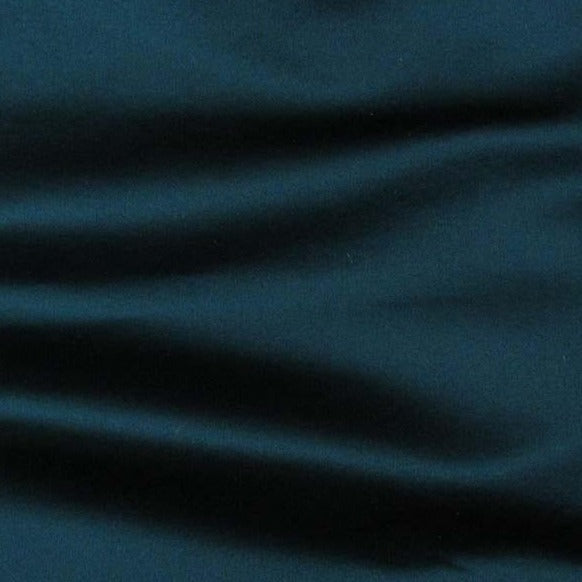 Duchess showing he green color version on heavy weight mulberry silk satin with moderate drape