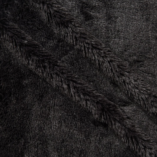 Elise Plain presenting the charcoal color version pure polyester Soft faux fur closeup