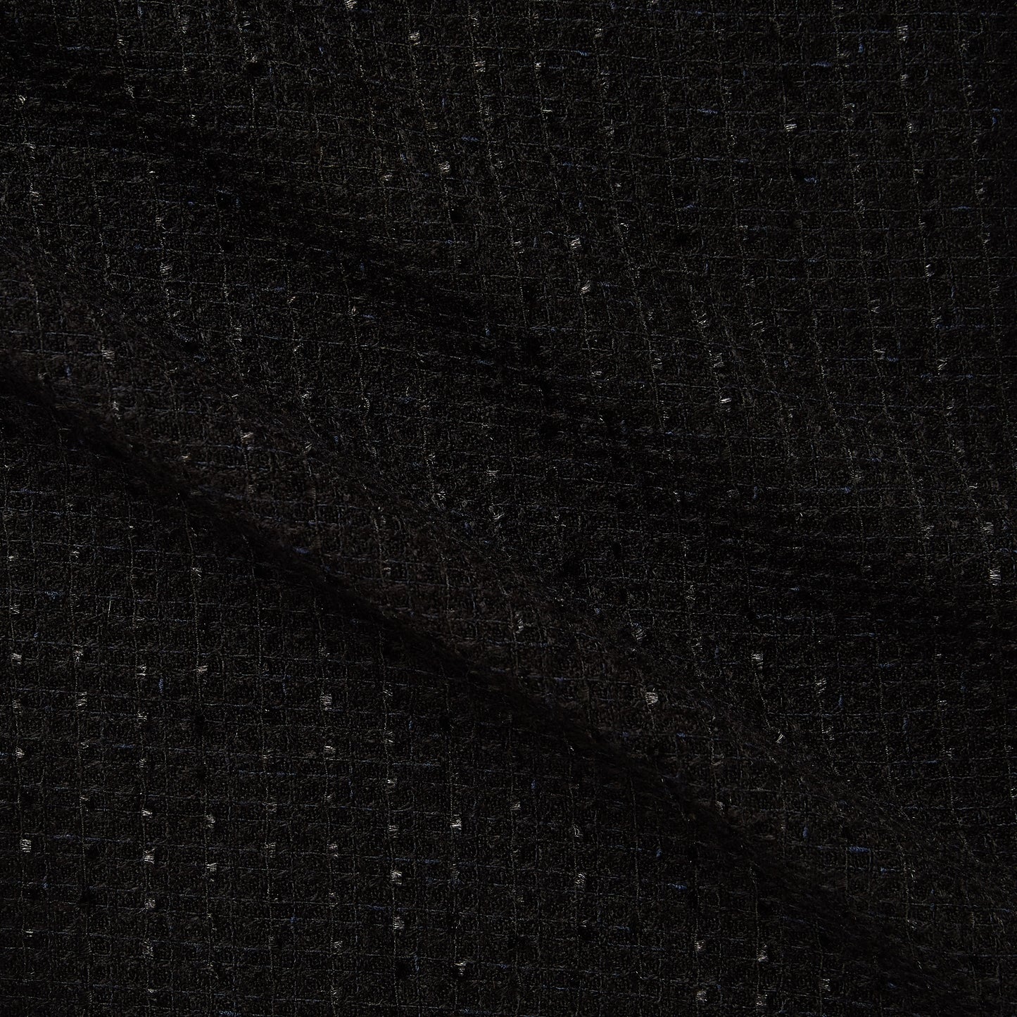 Eyelash presenting the Black color woven yarn dyed Tweed-like Acrylic Blend