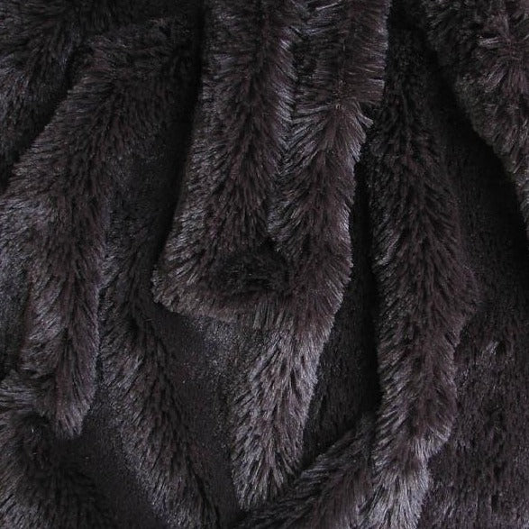 Elise Plain presenting the charcoal color version pure polyester Soft faux fur shown folded