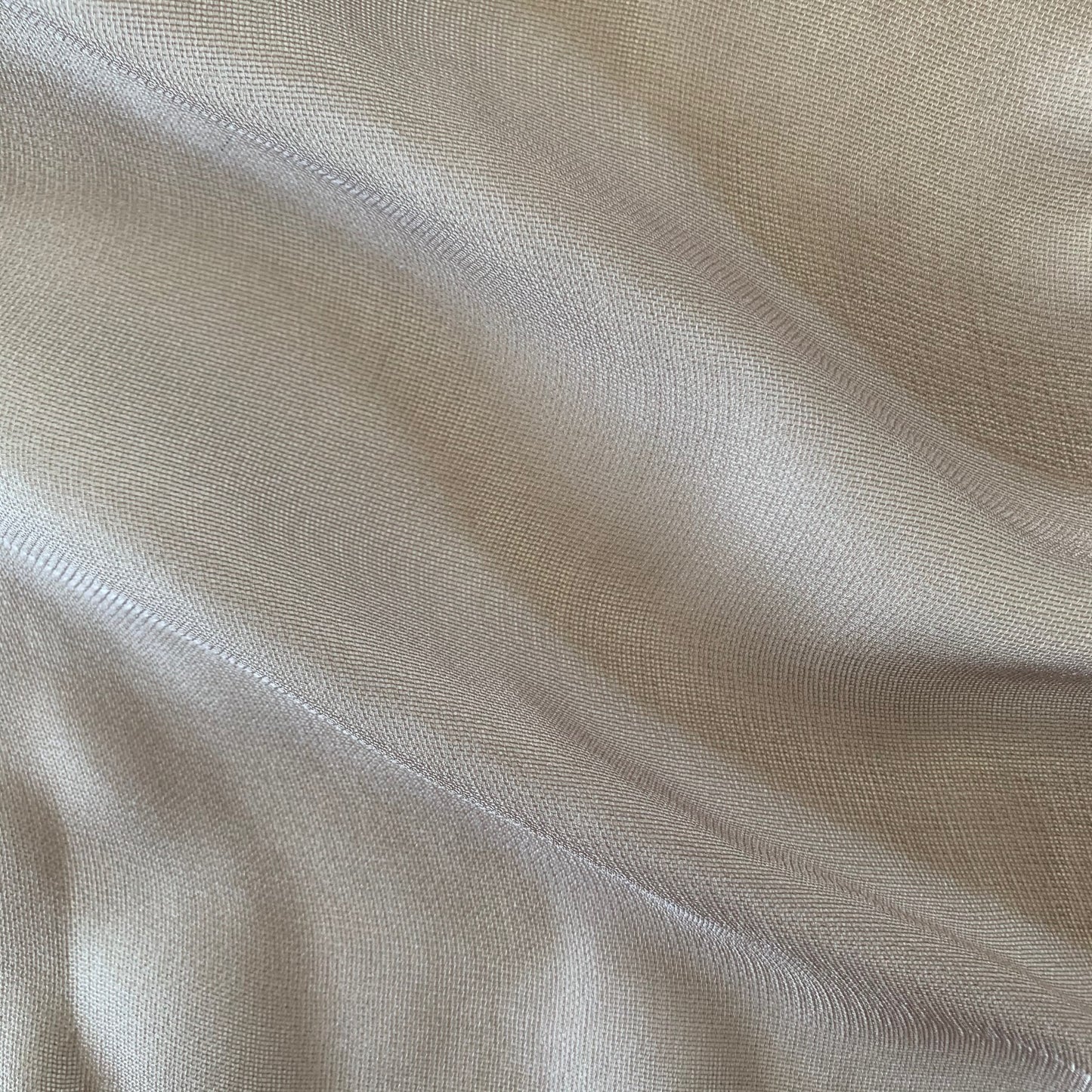Ghost Mesh presenting the mocha color version of a fine and delicate pure silk mesh with subtle silk sheen