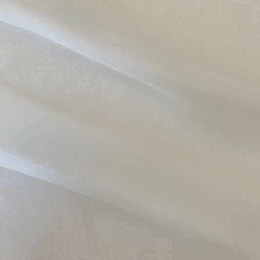 Ghost Mesh presenting the natural color version of a fine and delicate pure silk mesh with subtle silk sheen