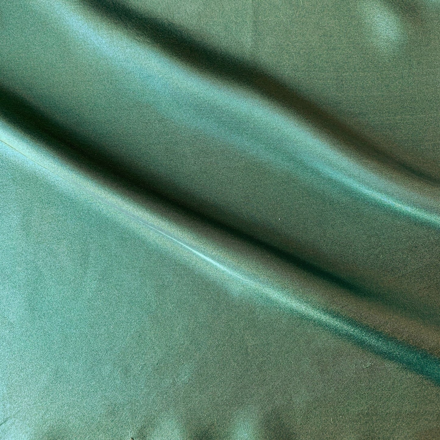 jap silk presenting the Bottle color version of a soft light weight mulberry pure silk with fluid drape and natural sheen