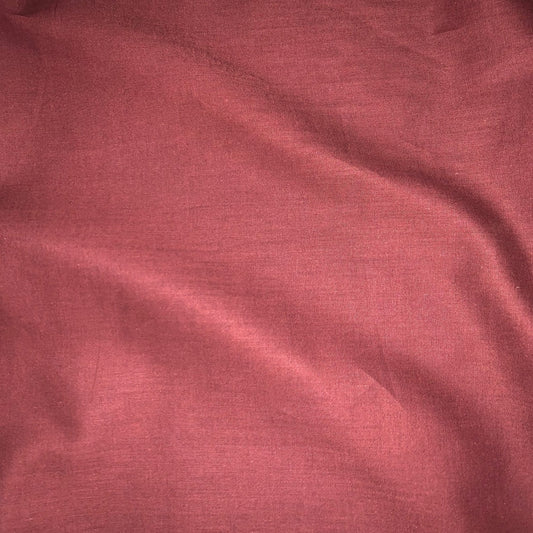 Haitana presenting the brick color version of a Fine light weight breathable soft smooth pure cotton voile