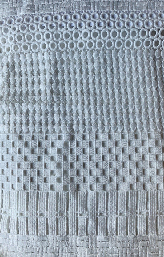 Presenting lido an ivory colored pure polyester paneled geometric design mid weight Guipure lace