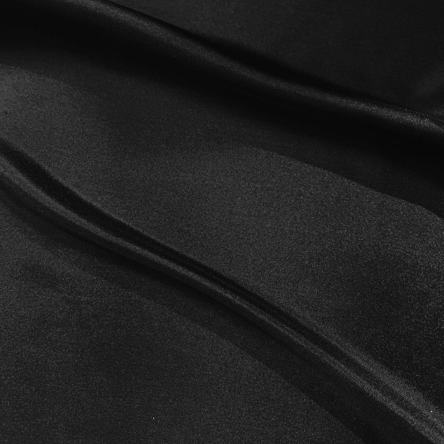 jap silk presenting the Black color version of a soft light weight mulberry pure silk with fluid drape and natural sheen