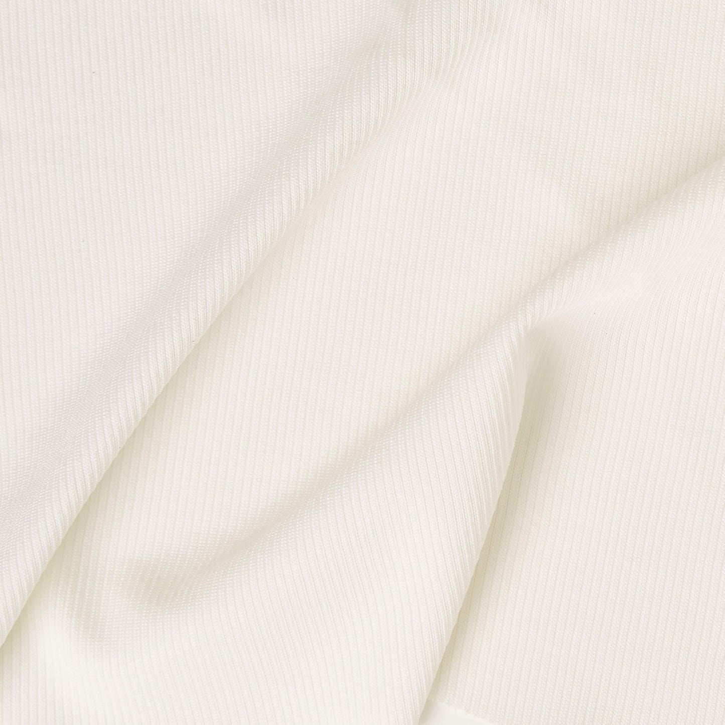 legion presenting the ivory color version of a stretch mid weight ribbed knit polyester with spandex blend and good drape