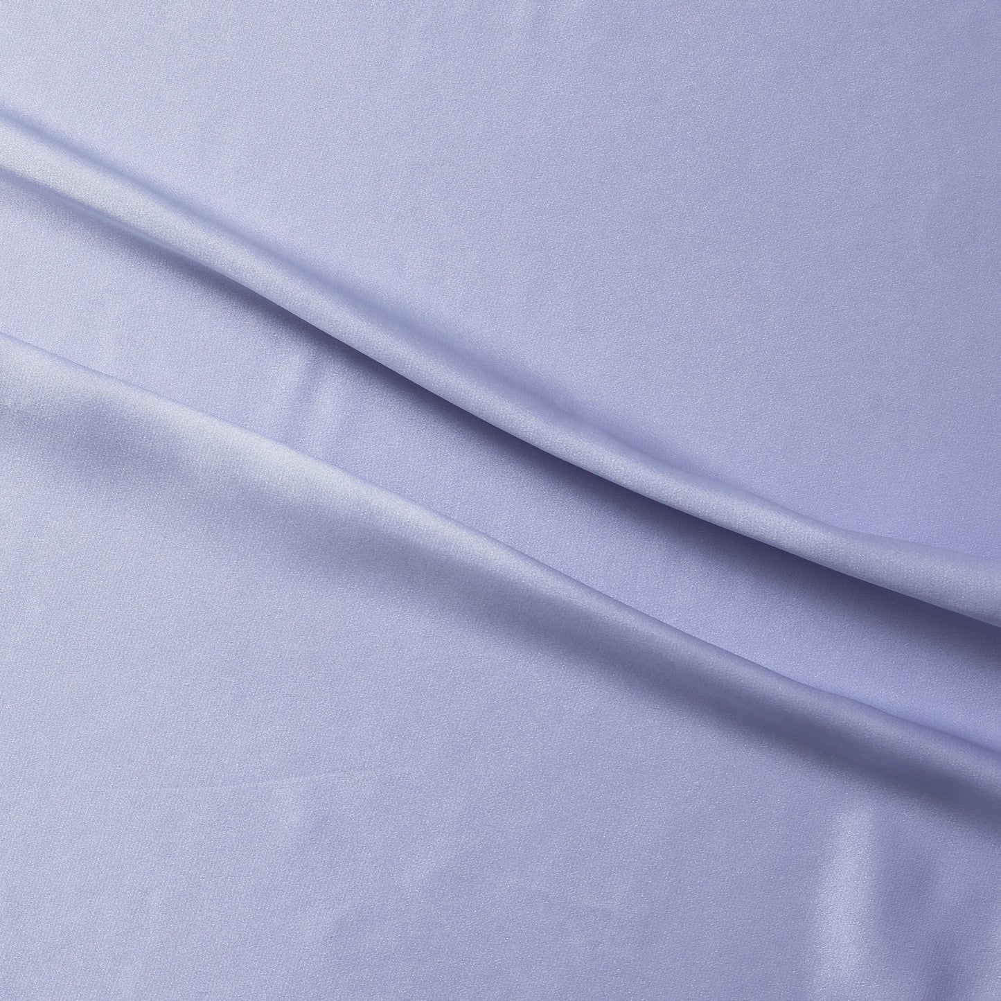 lola presenting the powder color version of a stretch light weight soft satin polyester with spandex