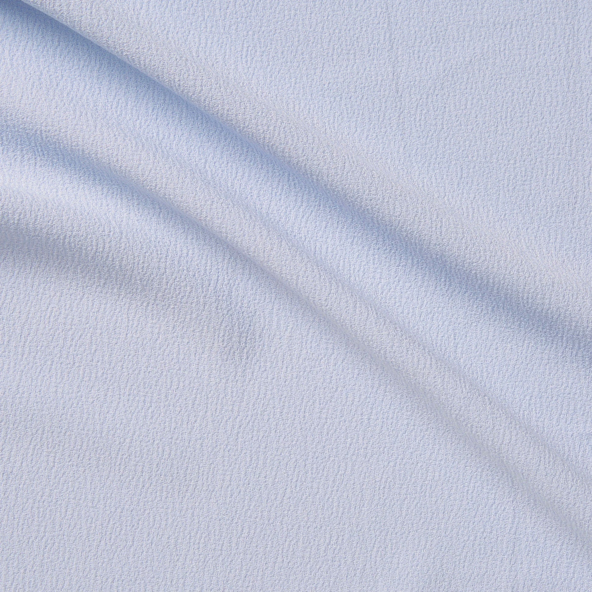 London Crepe presenting the ice color version with 2 way stretch knit polyester with spandex