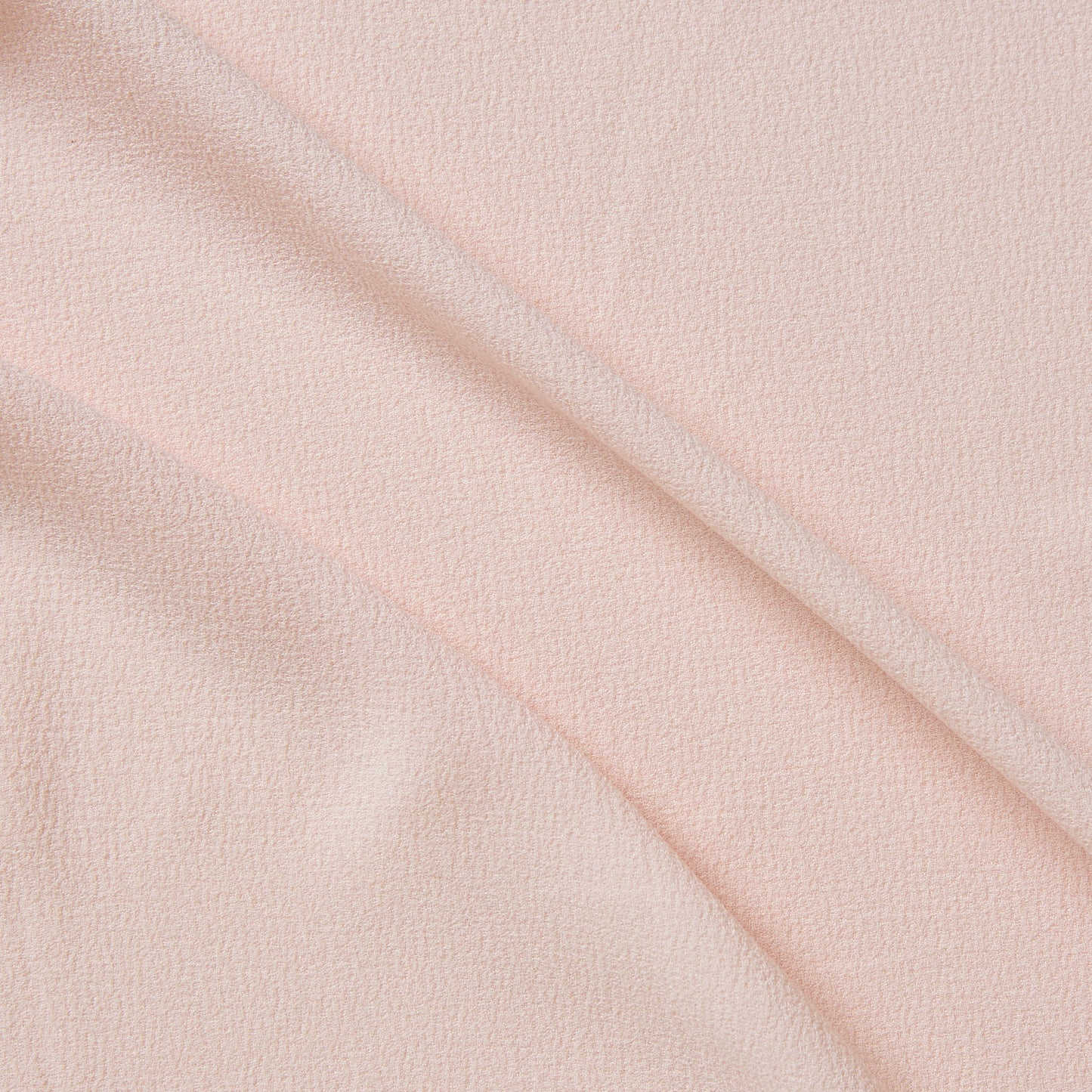 London Crepe presenting the pink color version with 2 way stretch knit polyester with spandex