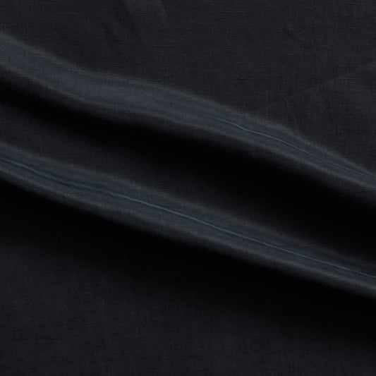 marcello displaying the navy color version of a linen blend with Tencel and Cuprammonium featuring a subtle satin sheen and fluid drape