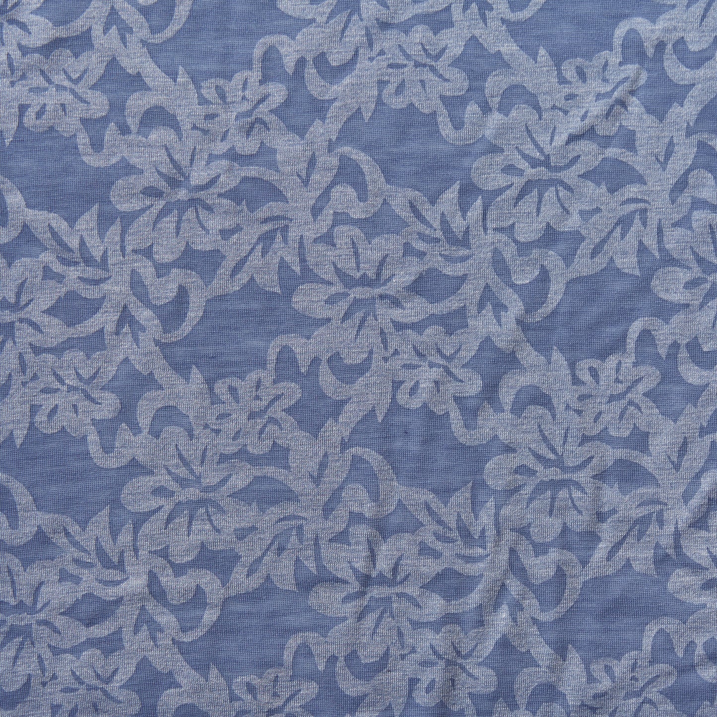 maui presenting the blue color version of a floral burnout print on polyester and rayon stretch jersey knit