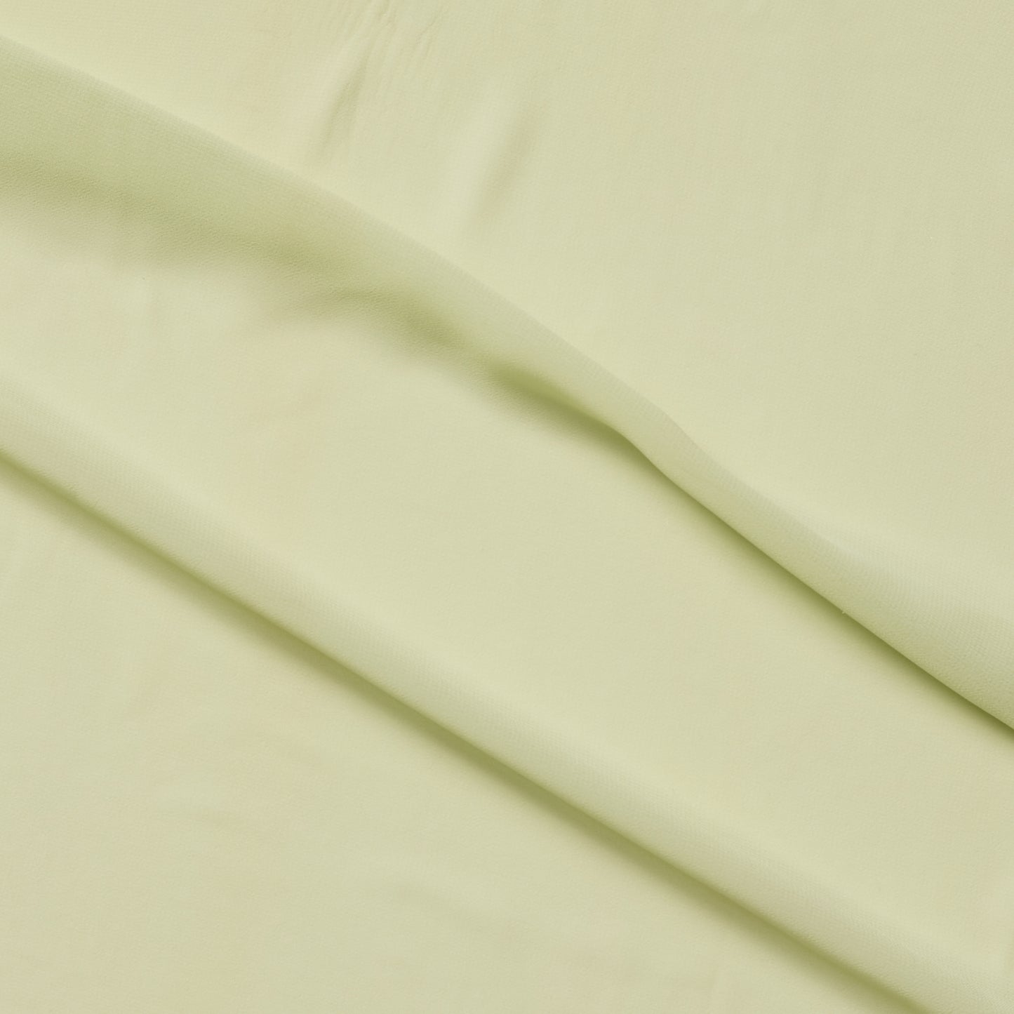 microgette presenting the apple color version of a sheer soft plain weave Polyester microfibre with matte face and good drape