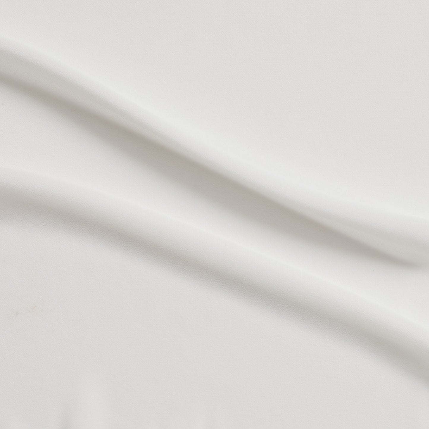 microgette presenting the ivory color version of a sheer soft plain weave Polyester microfibre with matte face and good drape