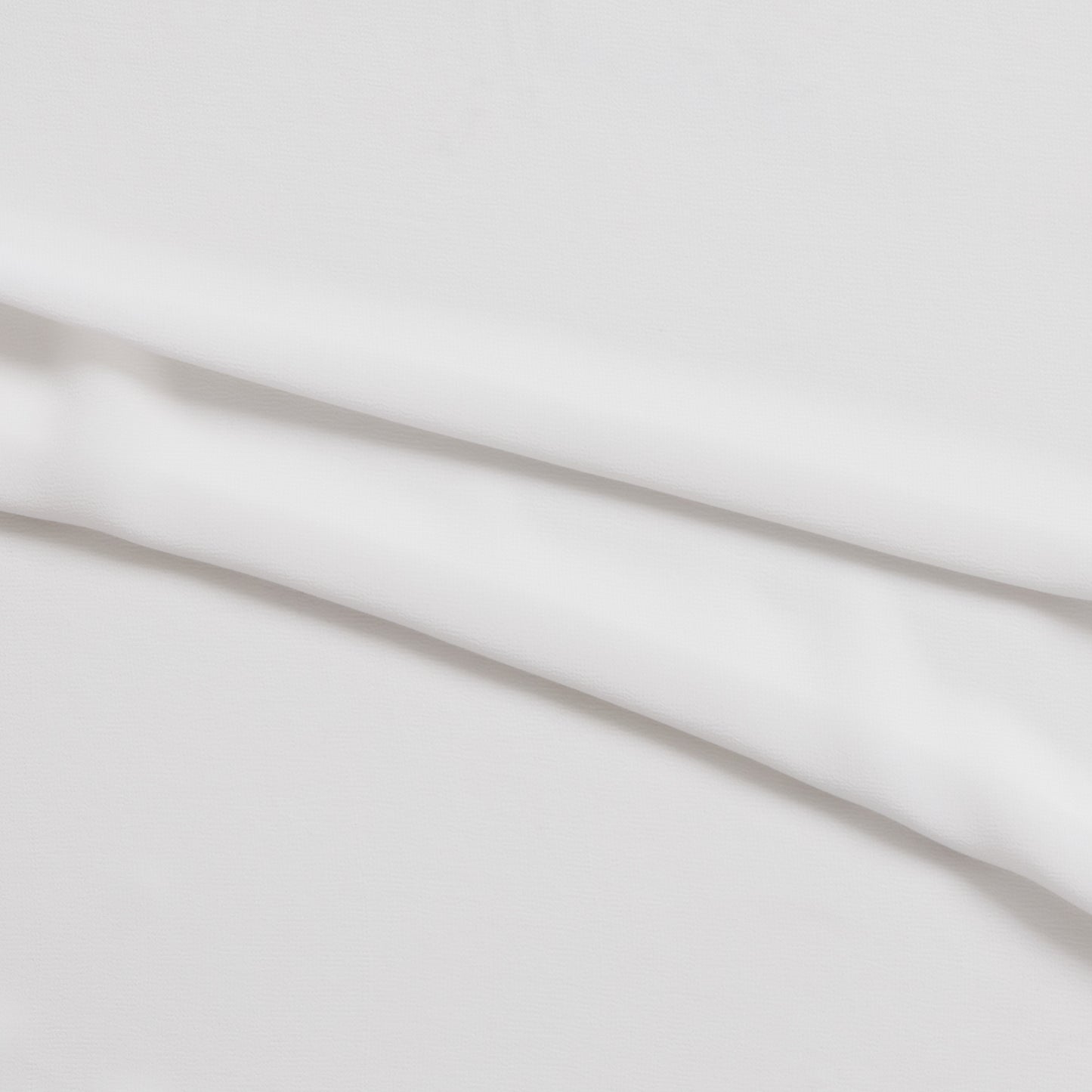 microgette presenting the white color version of a sheer soft plain weave Polyester microfibre with matte face and good drape