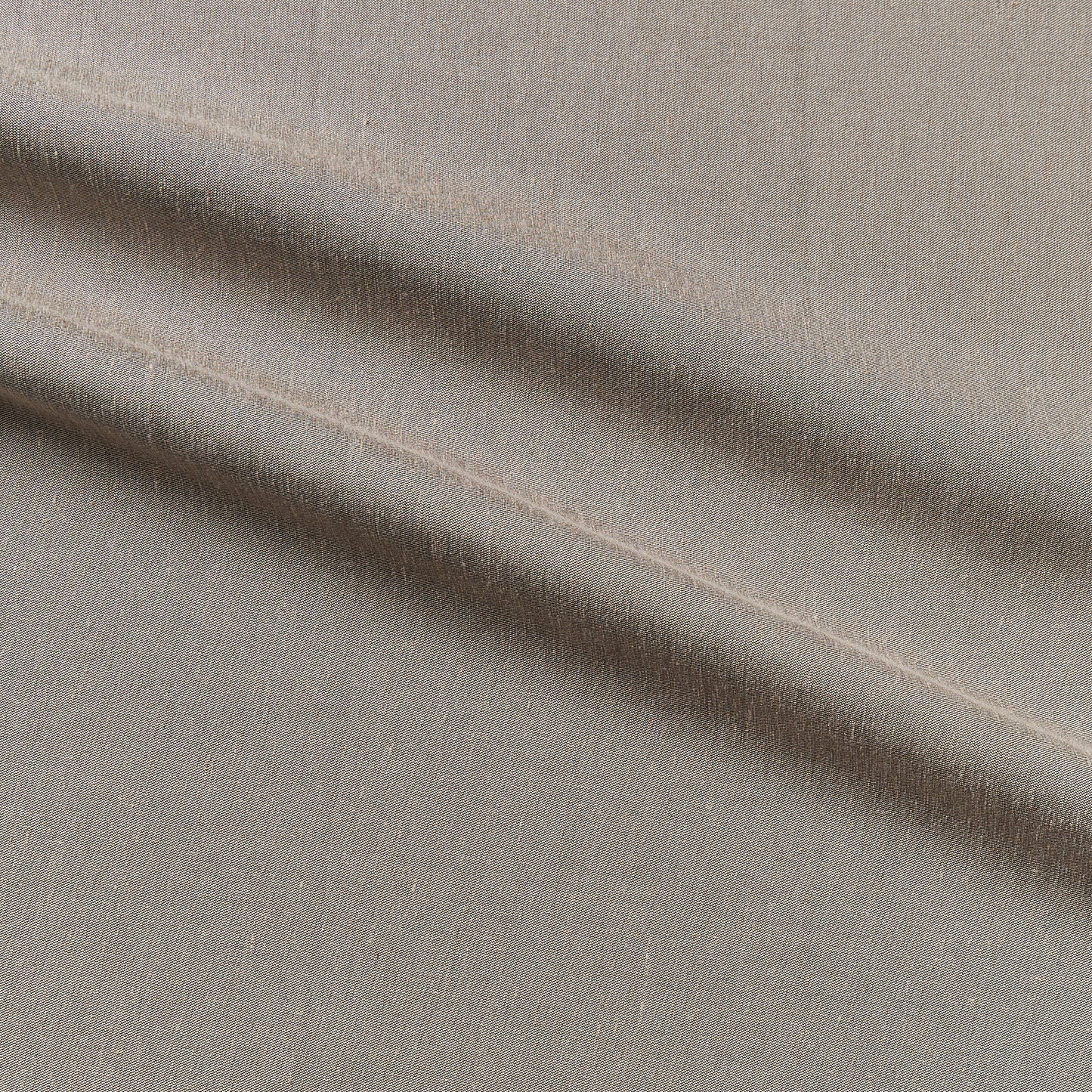 millenium demonstrating the taupe color version of a soft rayon poly and linen blend yarn dyed woven face with chocolate colored satin back